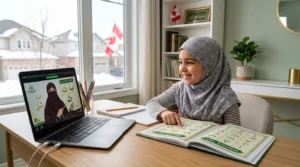 Young Muslim child learning Noorani Qaida online with a Quran teacher from home in Canada